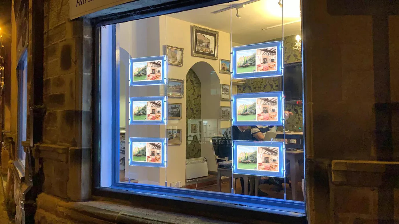 Revolutionize Your Estate Agent Window Displays with Digital Rod Displays