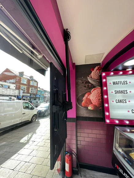 Side view of 32 inch high brightness digital signage display installed in retail shop window