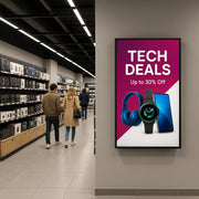 ScreenMoove SM43C-L 43 inch portrait digital signage display installed in a retail electronics store showing promotional advertising content