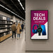 ScreenMoove SM43C-L 43 inch portrait digital signage display installed in a retail electronics store showing promotional advertising content